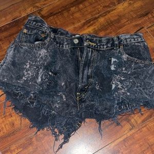 Shredded vintage Levi black cut off shorts